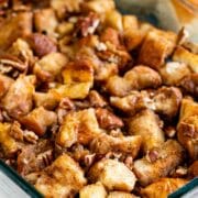 Monkey Bread in a glass baking dish with pecans on top