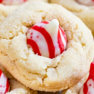 Close up shot of peppermint blossom cookies with recipe title on top of image