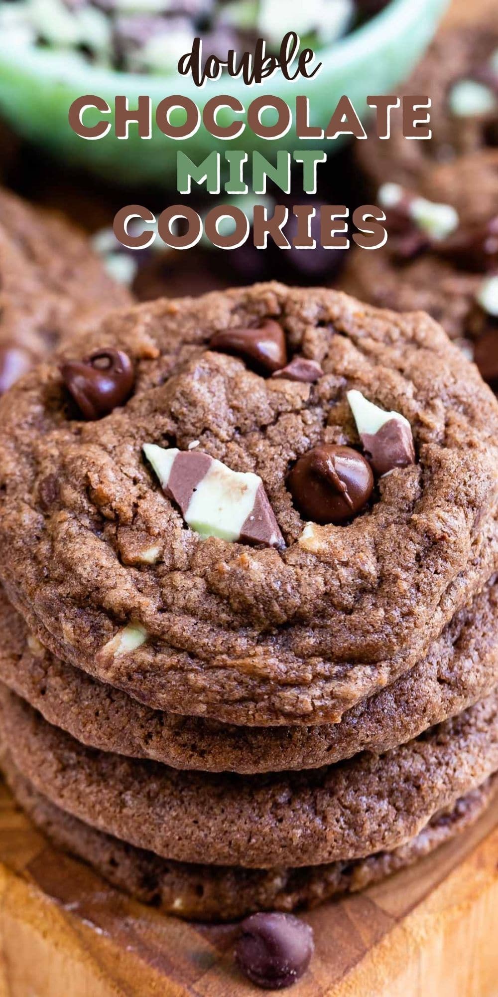 Stack of double chocolate mint cookies on wood cutting board with recipe title on top of image