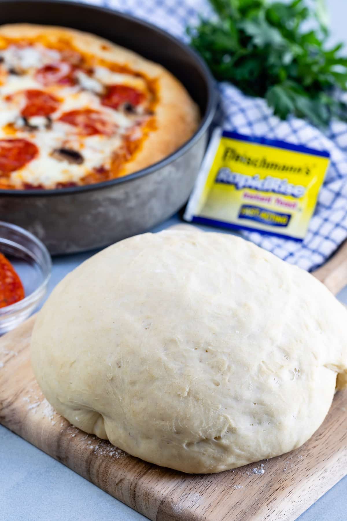 pizza dough on board