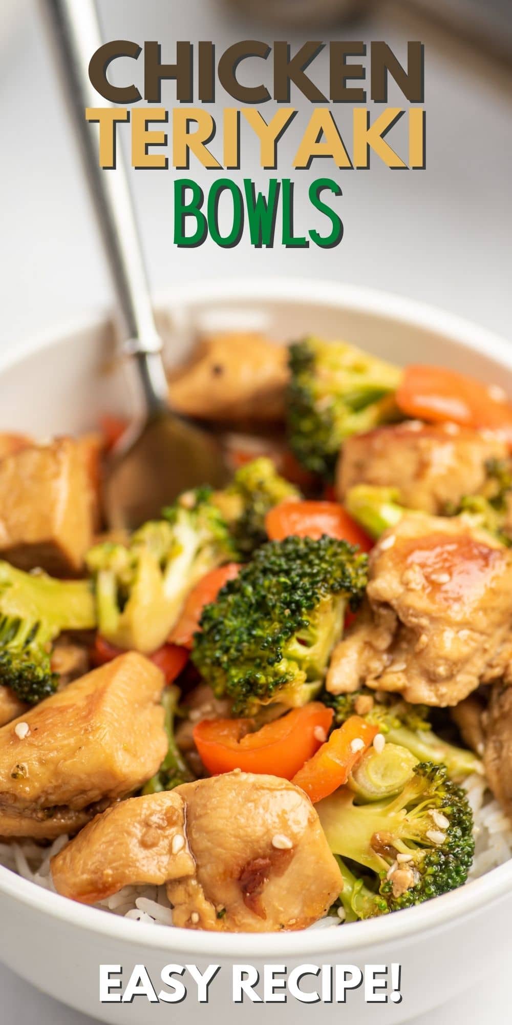 Chicken teriyaki bowl in a white bowl with fork sticking out and recipe title on top of image