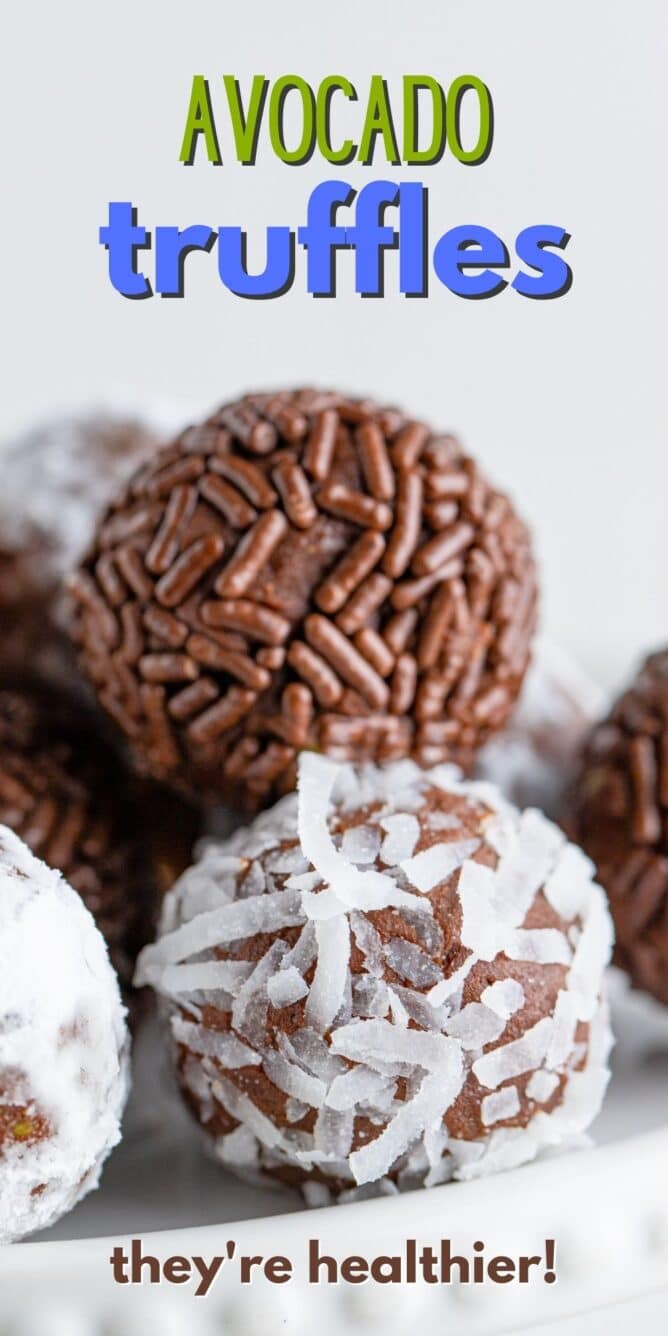 Close up shot of chocolate avocado truffles with sprinkles and coconuts on the outside with recipe title on top of image