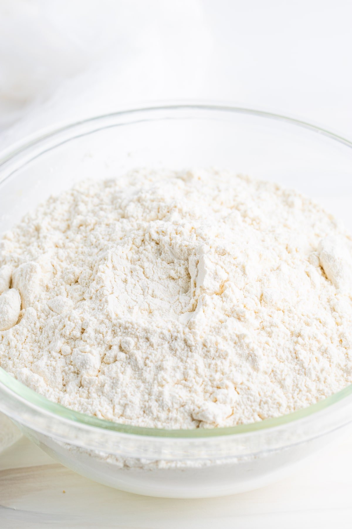 Flour in a large clear mixing bowl