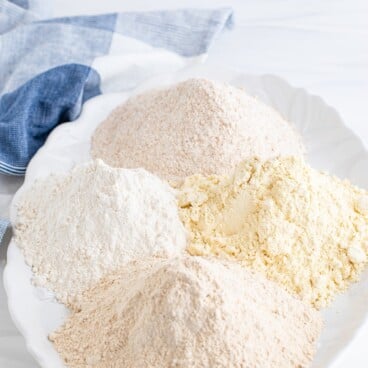 Four types of baking flours on a serving dish
