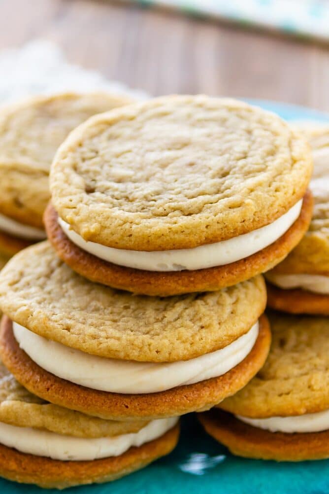 Stack of homemade golden oreos on a blue plate