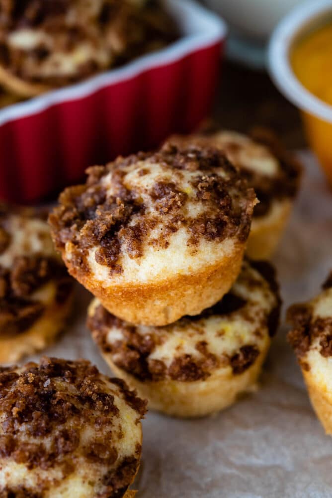 Mini crumb cake bites on counter with two stacked on eachother