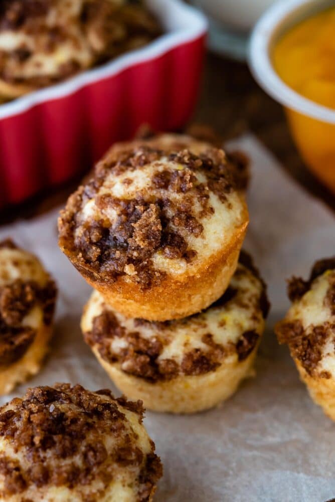 Mini crumb cake bites on counter with two stacked on eachother