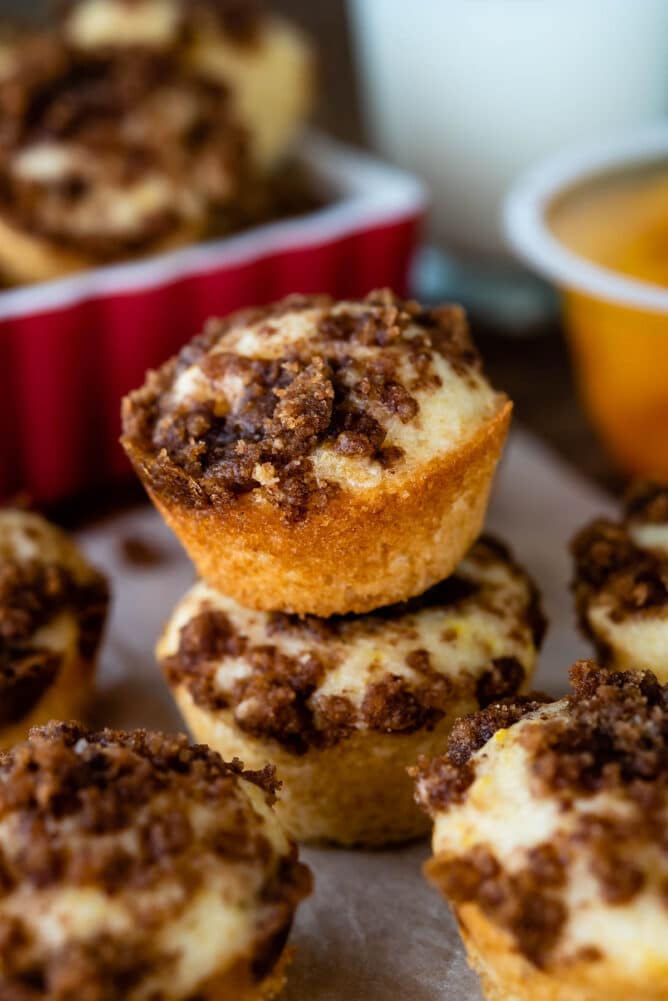 Mini crumb cake bites on counter with two stacked on eachother