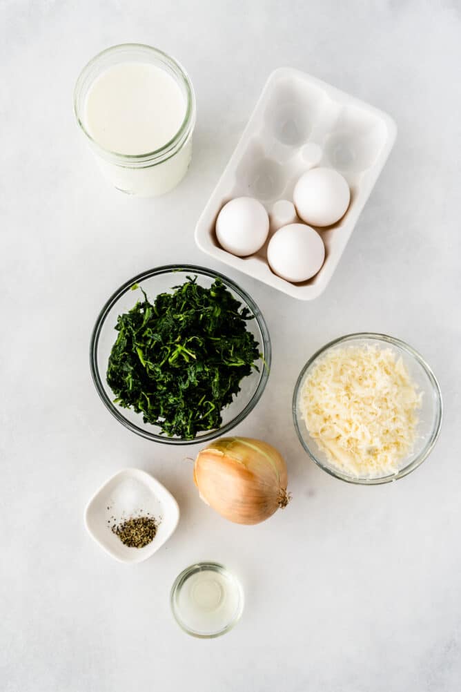 Overhead shot showing ingredients needed for spinach crustless quiche