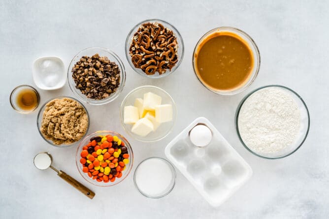 Overhead shot of all the ingredients for toffee pretzel peanut butter cookies