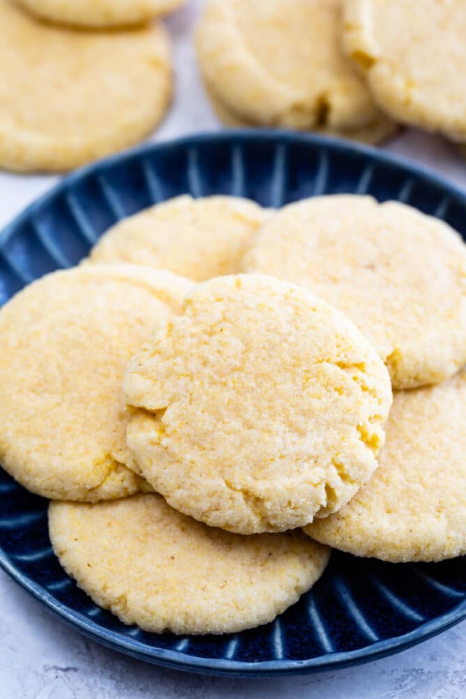 Blue plate full of cornmeal cookies