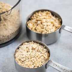 Stainless steel cups of old fashioned and quick oats