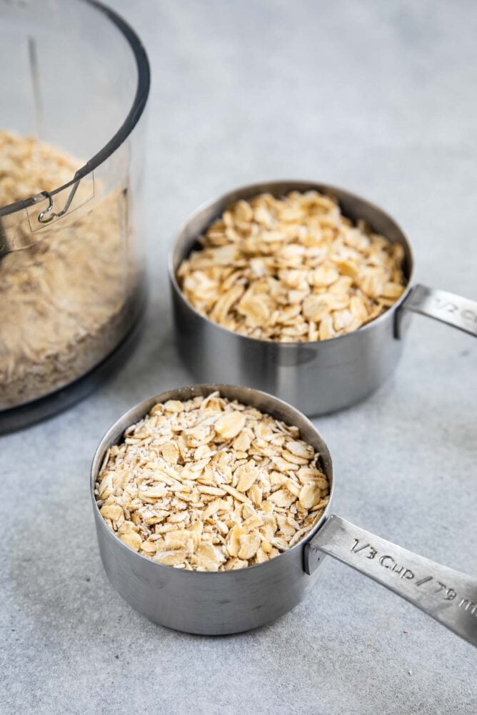 Stainless steel cups of old fashioned and quick oats