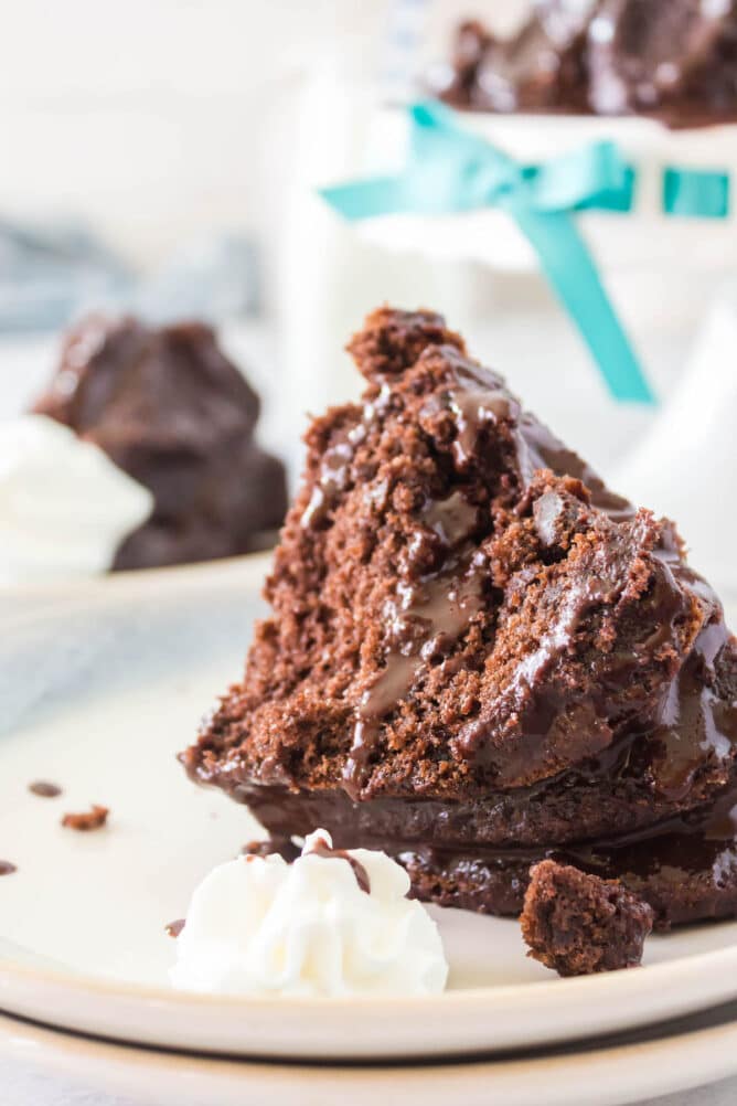 One slice of easy chocolate bundt cake on a white plate