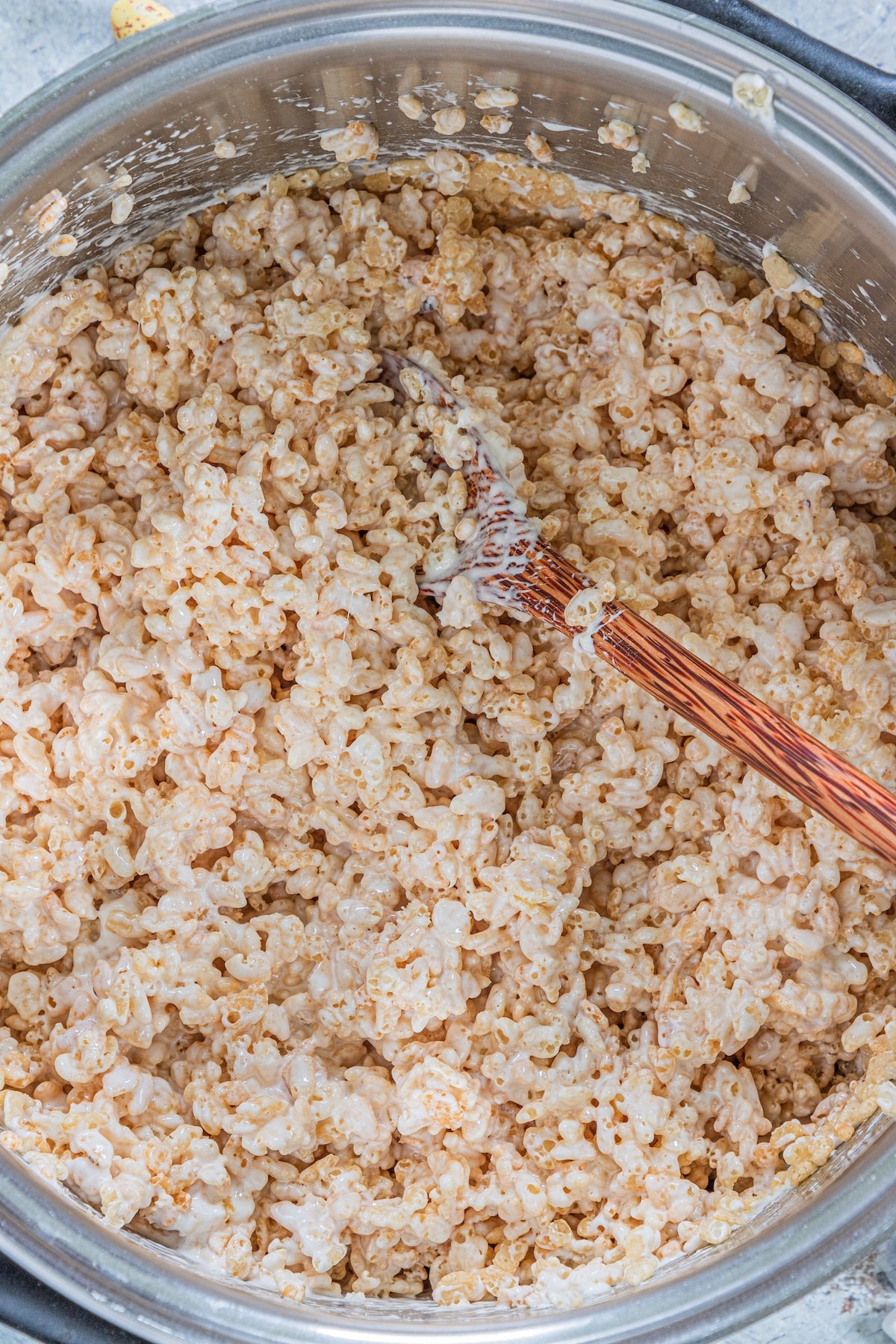 process shot of easter Rice Krispie treats being made.