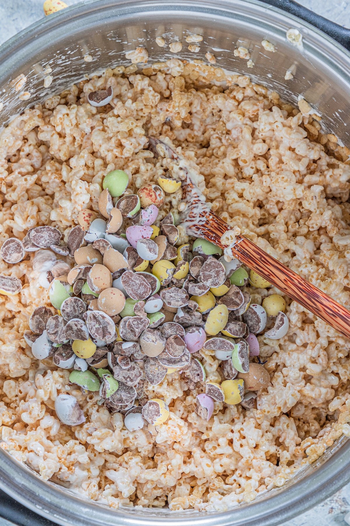 process shot of easter Rice Krispie treats being made.