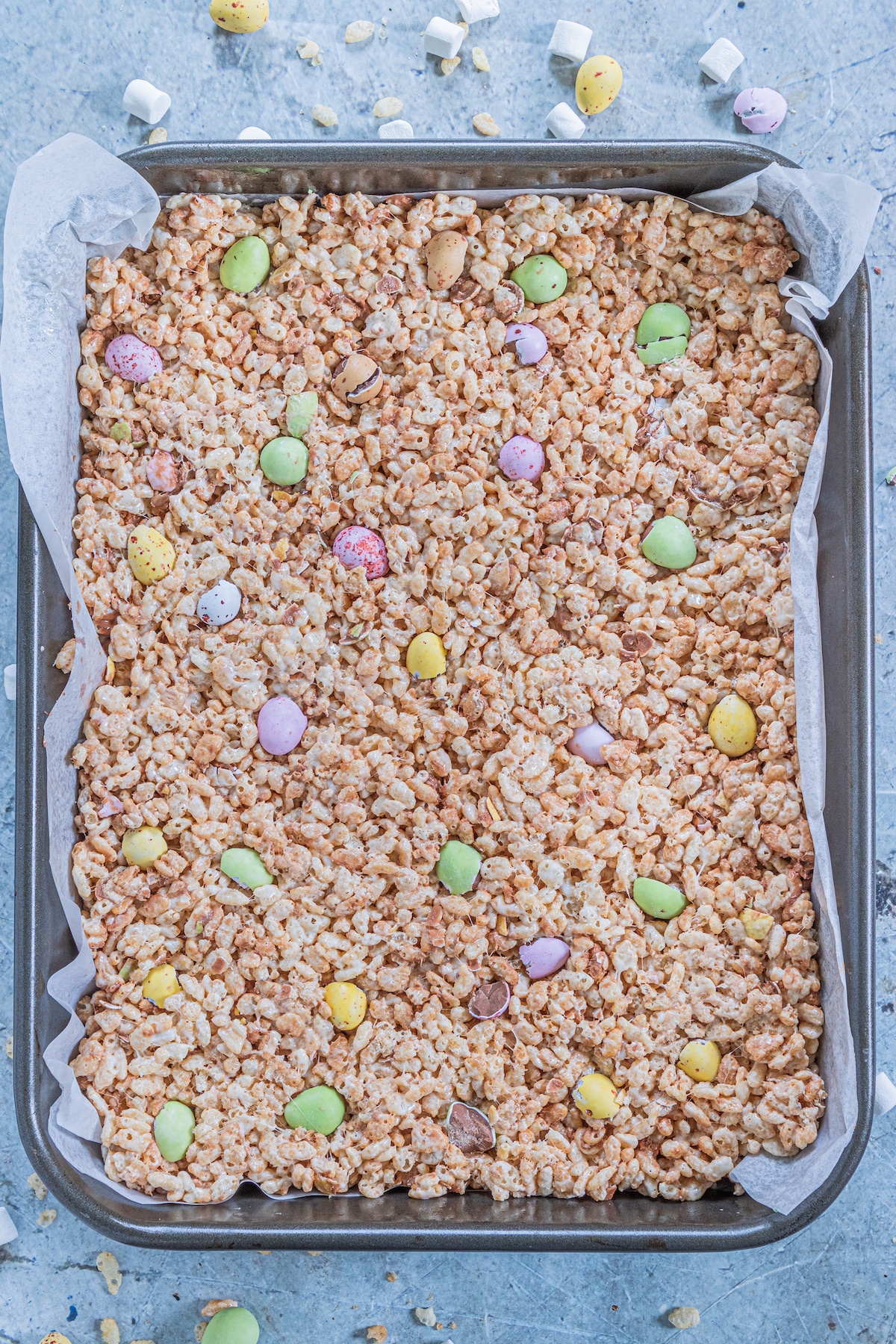 process shot of easter Rice Krispie treats being made.