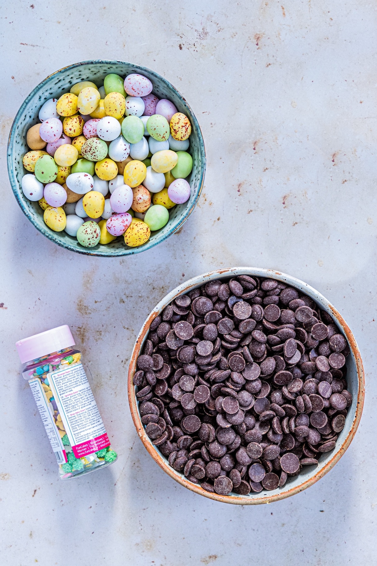 Overhead view of the three ingredients needed to make easter candy bark