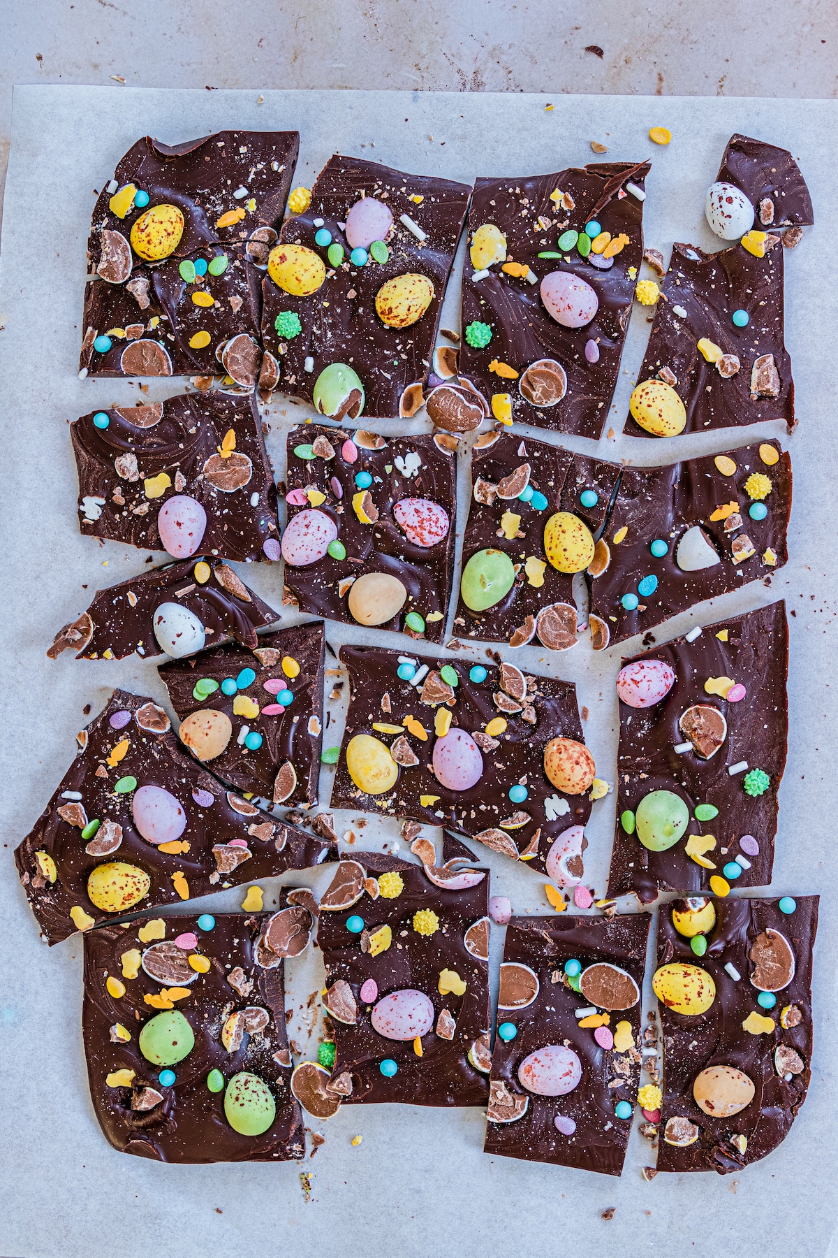 Overhead shot of easter candy bark broken into individual pieces