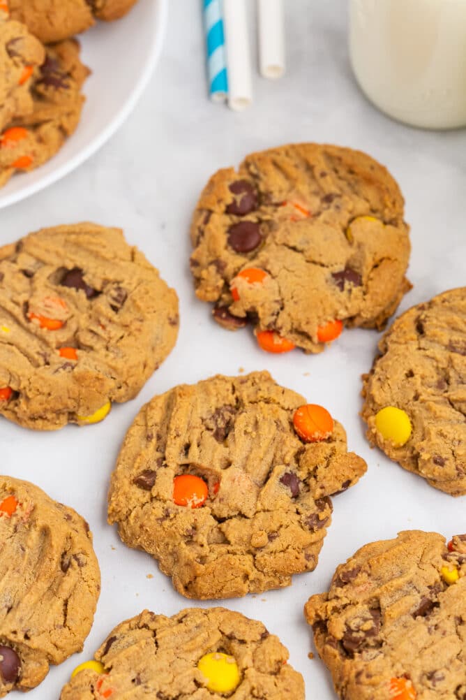 Reese's overload peanut butter cookies on parchment paper