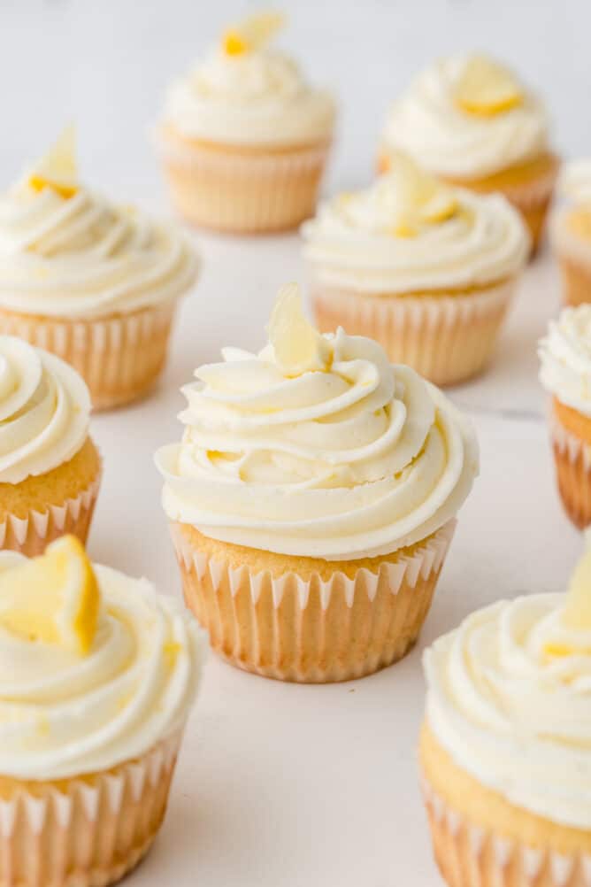 A bunch of perfect triple lemon cupcakes topped with lemon buttercream