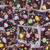 Overhead view of easter candy bark with recipe title on top of image