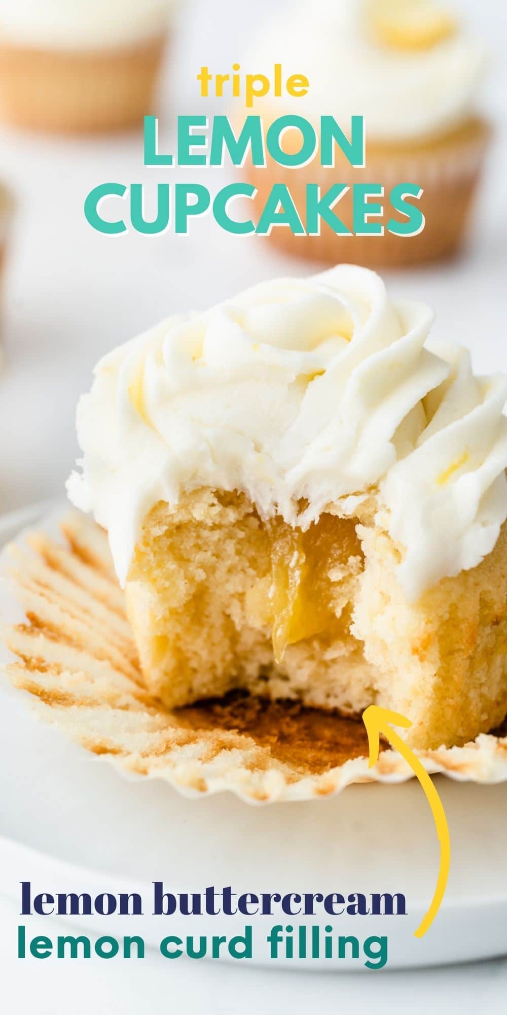 A perfect triple lemon cupcake cut in half to show lemon curd filling with recipe title on top of image