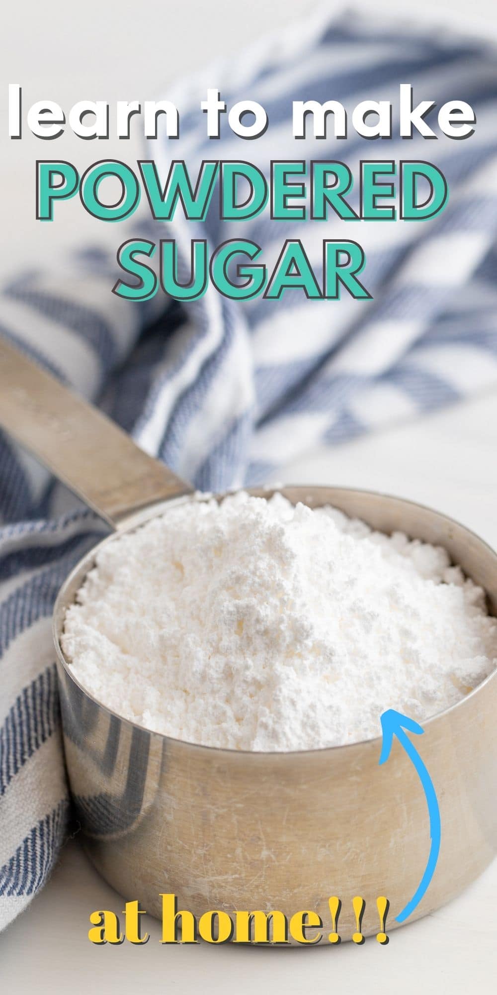 Stainless steel measuring cup full of powdered sugar with post title on top of image