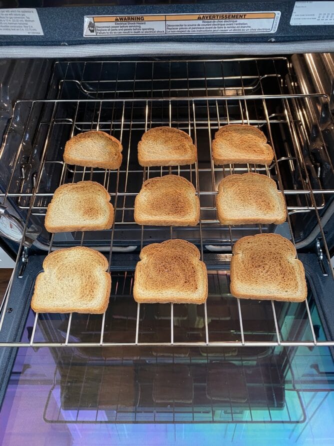 9 slices of toasted bread on oven rack