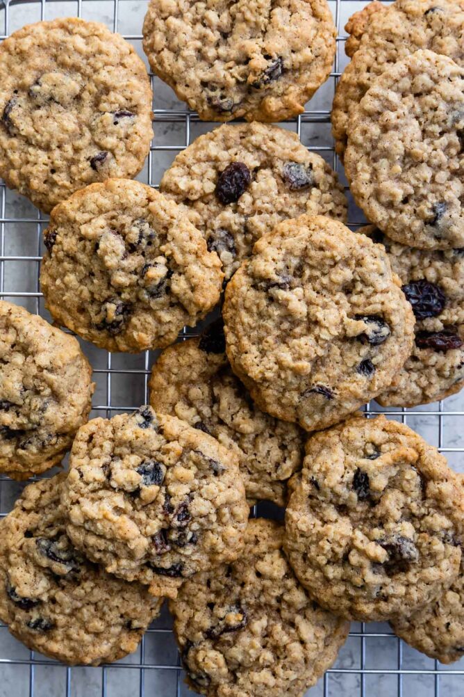 Overhead shot of oatmeal raisin cookies on wire cooling rack