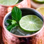 Close up overhead shot of moscow mule topped with mint leaves and a lime slice