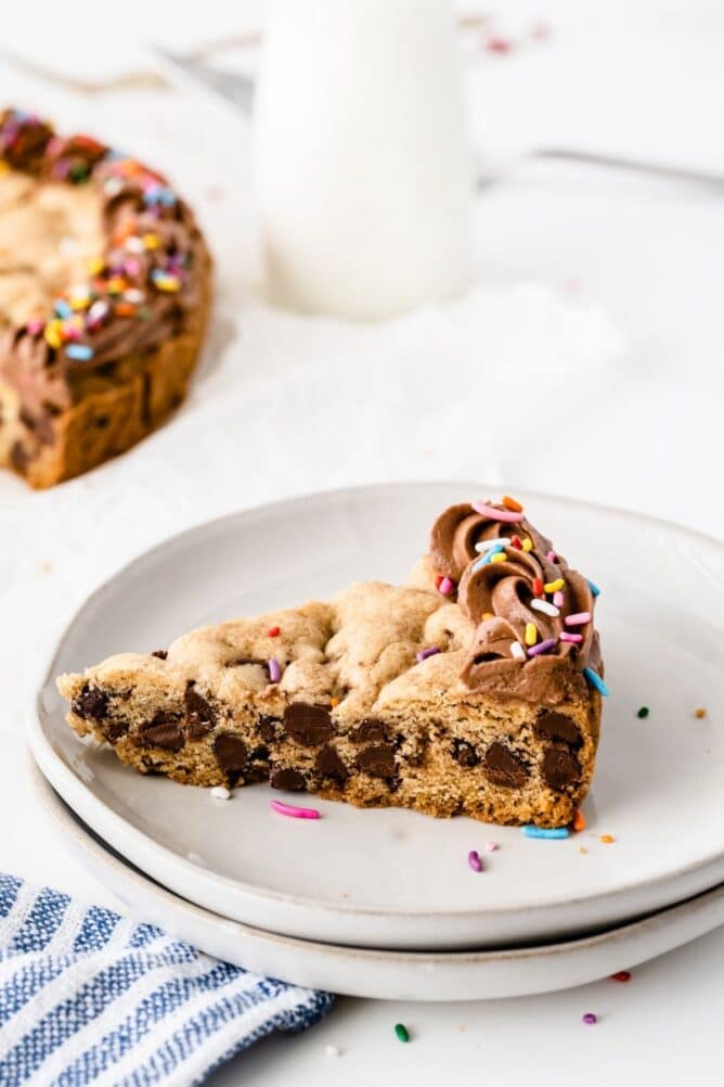 One slice of cookie cake on a plate