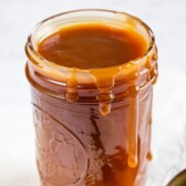 Mason jar full of easy homemade caramel sauce