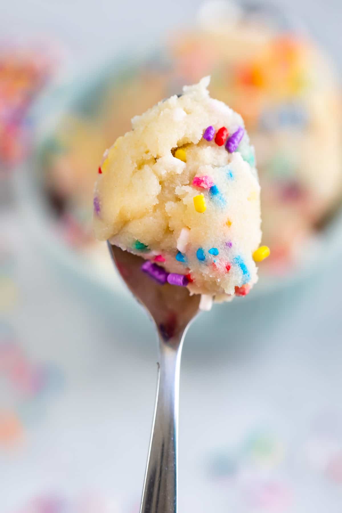 Close up of a spoonful of edible sugar cookie dough