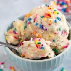 Small bowl full of edible sugar cookie dough with rainbow sprinkles