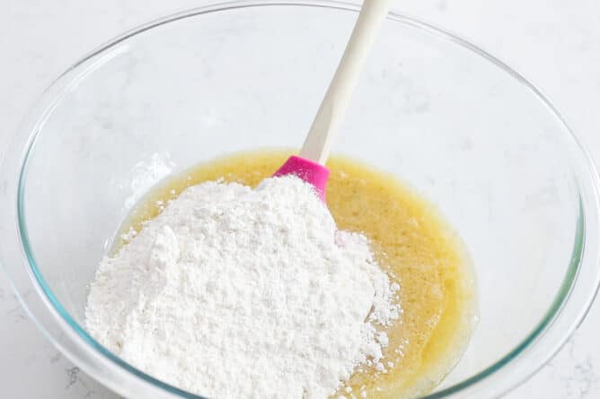 batter in bowl with spatula and pancake mix
