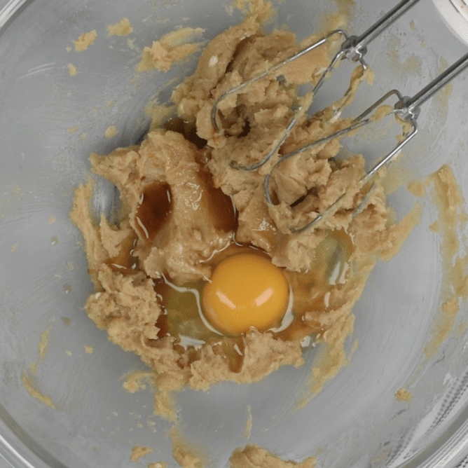 bowl with cookie dough and egg and vanilla