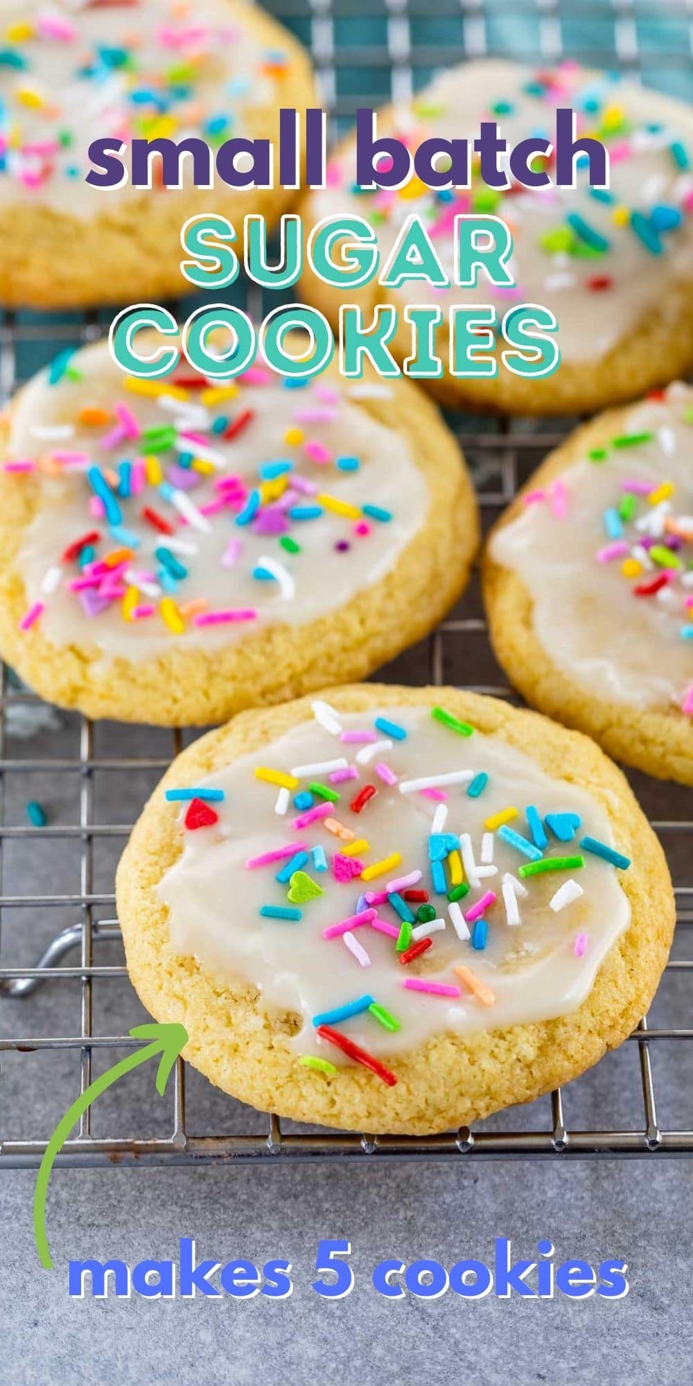 Five sugar cookies with icing and sprinkles on a wire cooling rack with recipe title on top of image