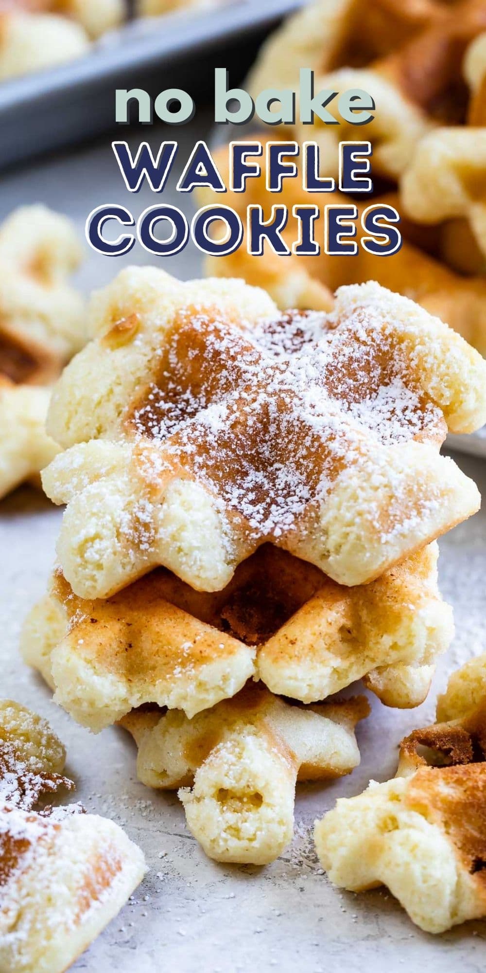 Stack of no bake waffle cookies with powdered sugar on top and recipe title on top of image