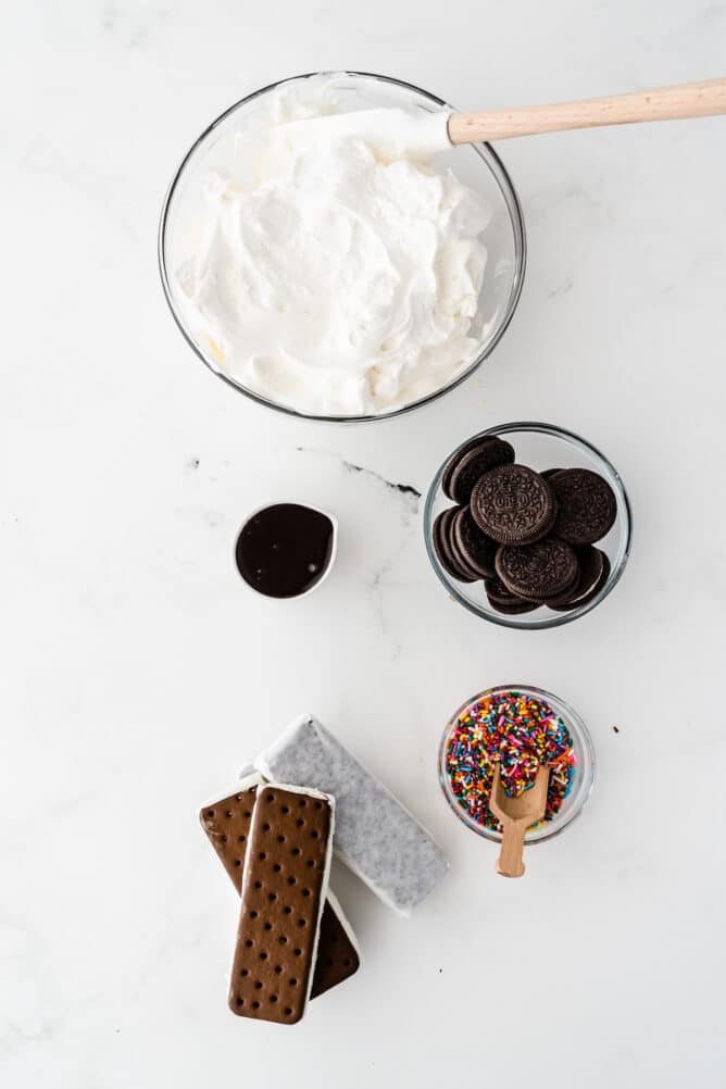 Easy Ice Cream Sandwich Cake | Crazy for Crust 2 Overhead shot showing five ingredients needed to make ice cream sandwich cake