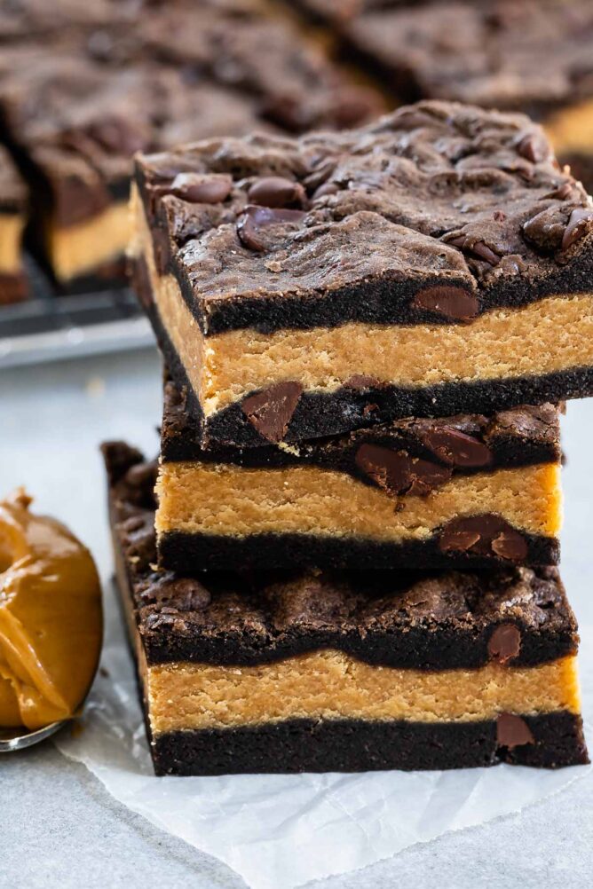 Stack of peanut butter stuffed chocolate cookie bars