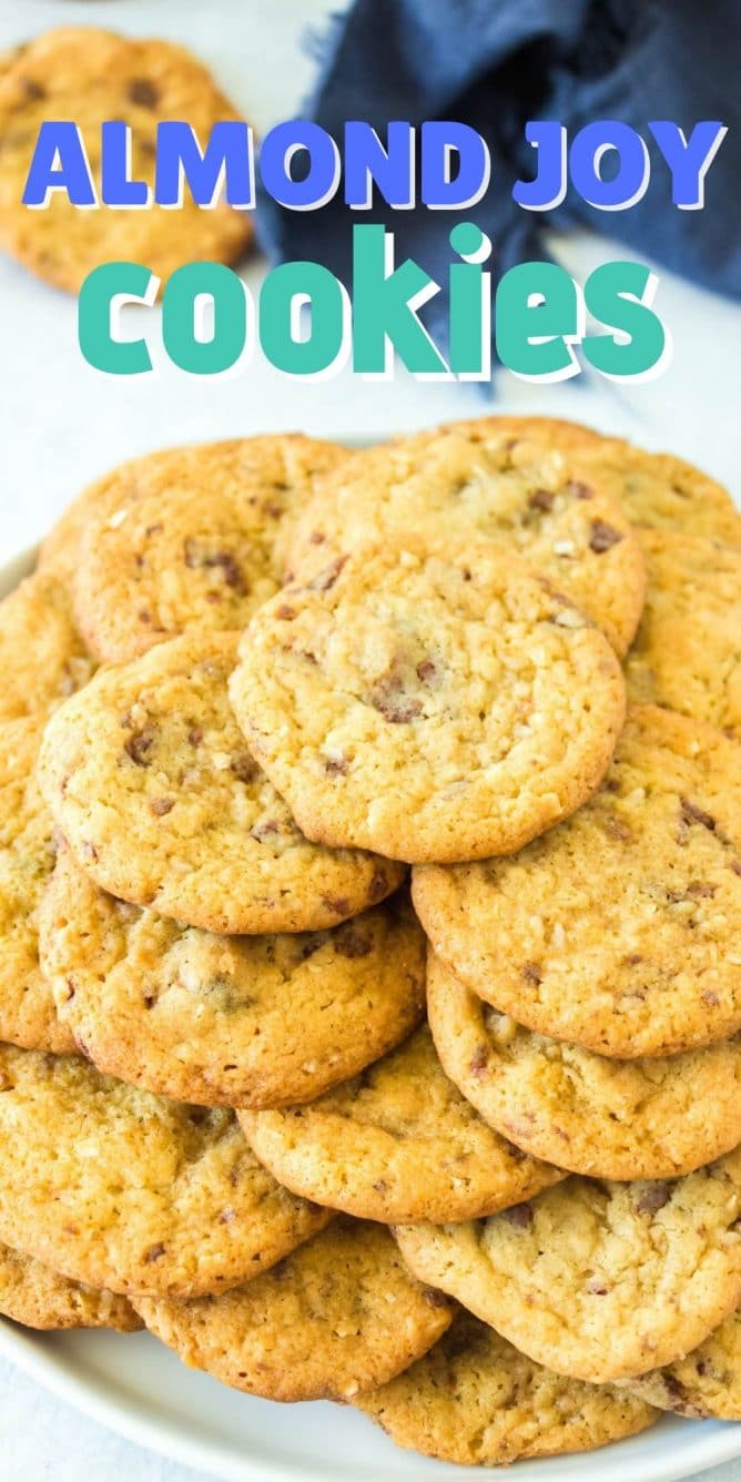 Plate full of almond joy pudding cookies with recipe title on top of image