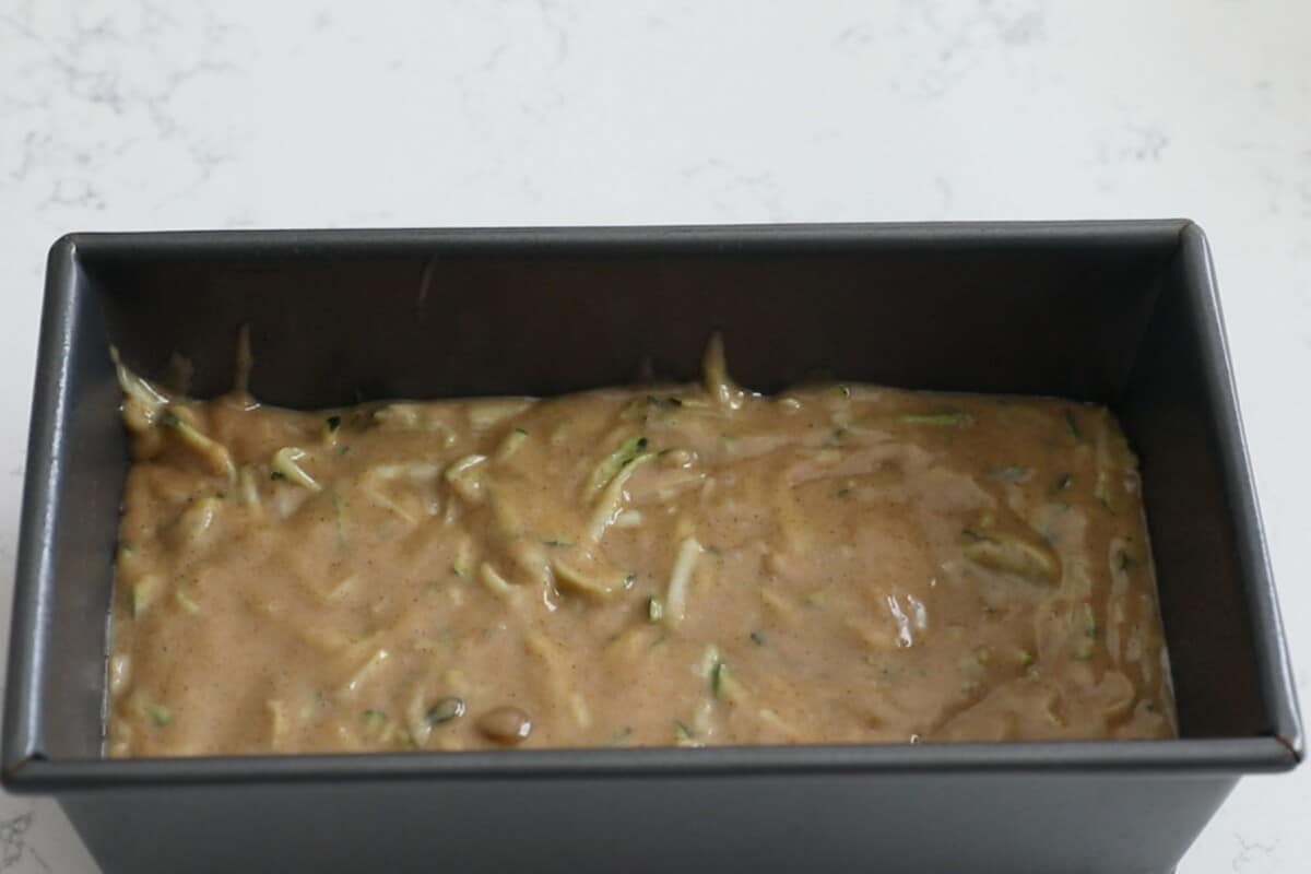 zucchini bread batter in pan.