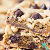 Stack of peanut butter cookie bars with recipe title on top of image