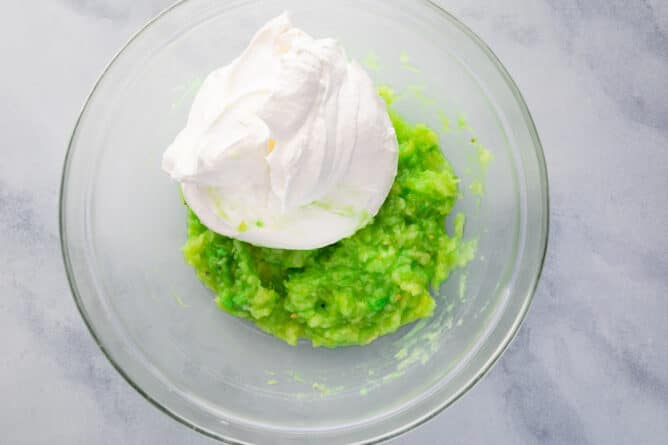 bowl of green pudding with cool whip