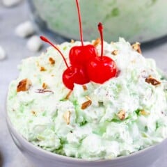 bowl of fluff with cherries on top