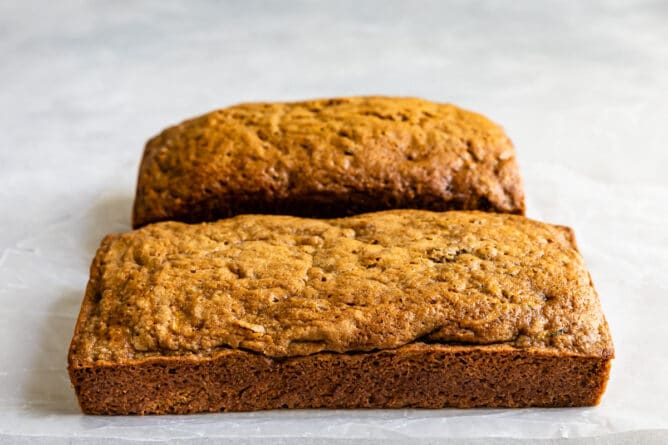 Two loaves of zucchini bread side by side