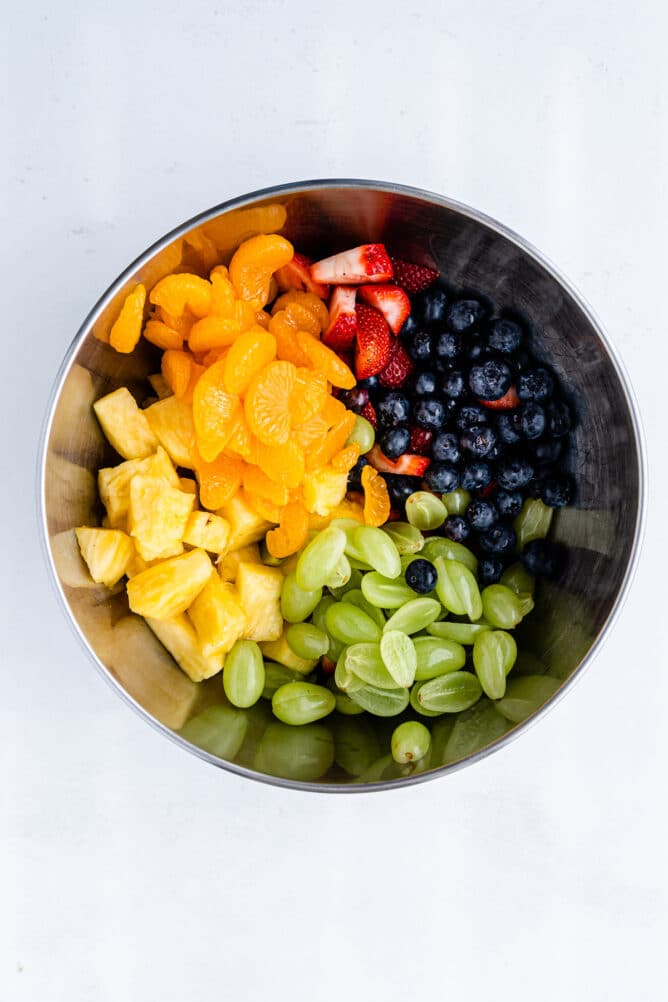 Overhead shot of all fruit together in one big bowl not mixed together