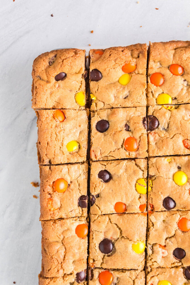 Overhead shot of loaded cookie bars cut into squares