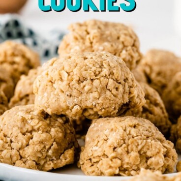 Peanut butter no bake cookies on a white plate with recipe title on top of image